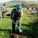 Koh from Better World, Cameroon, tree planting at the Felin Uchaf Education Centre, Aberdaron, Gwynedd, North Wales