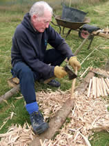 Will Willams,volunteer, making oak pegs on a building course at Menter Y Felin Uchaf, Aberdaron, North West Wales